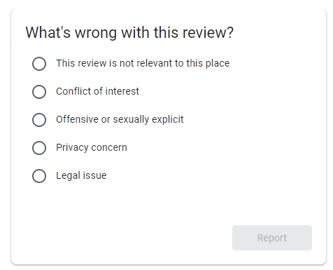 How do I flag a Google review to be removed?​