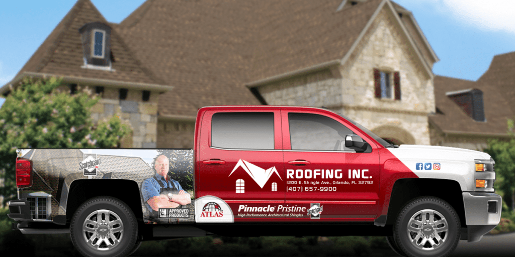 A roofing company wrap on a truck.