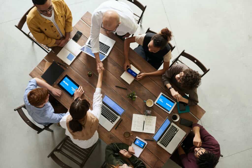A business association group in a meeting.