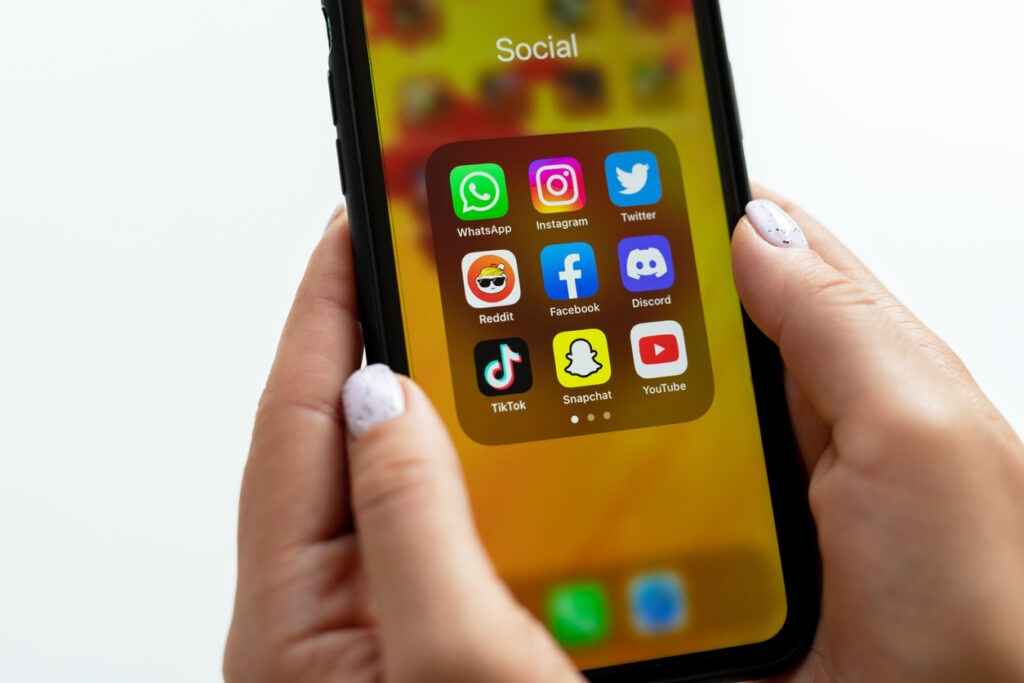 smartphone displaying social media icons